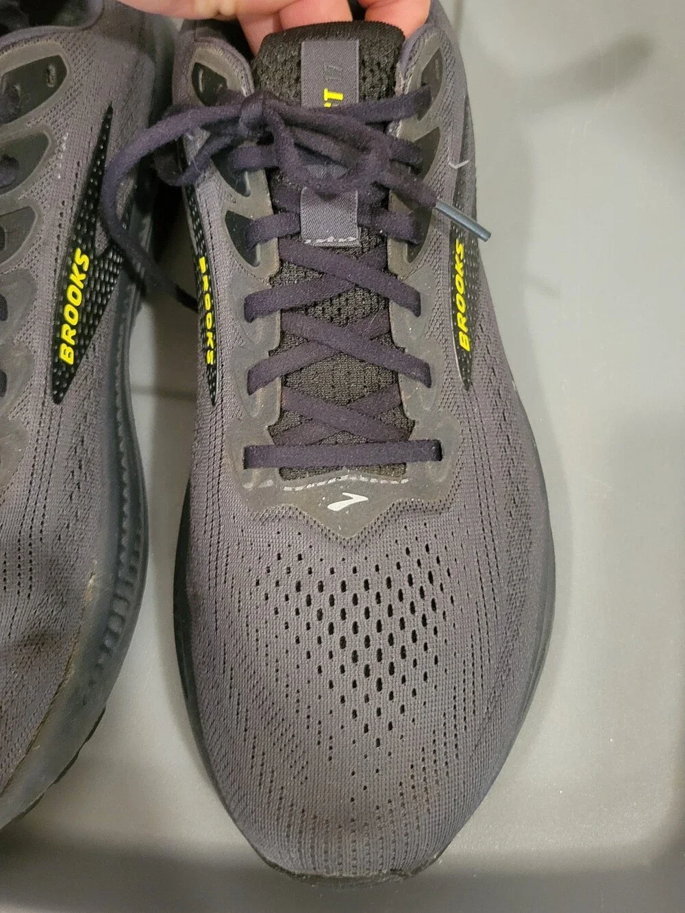 Brooks Ghost 17 running shoes feature a dark ebony and black colorway. Mens 13